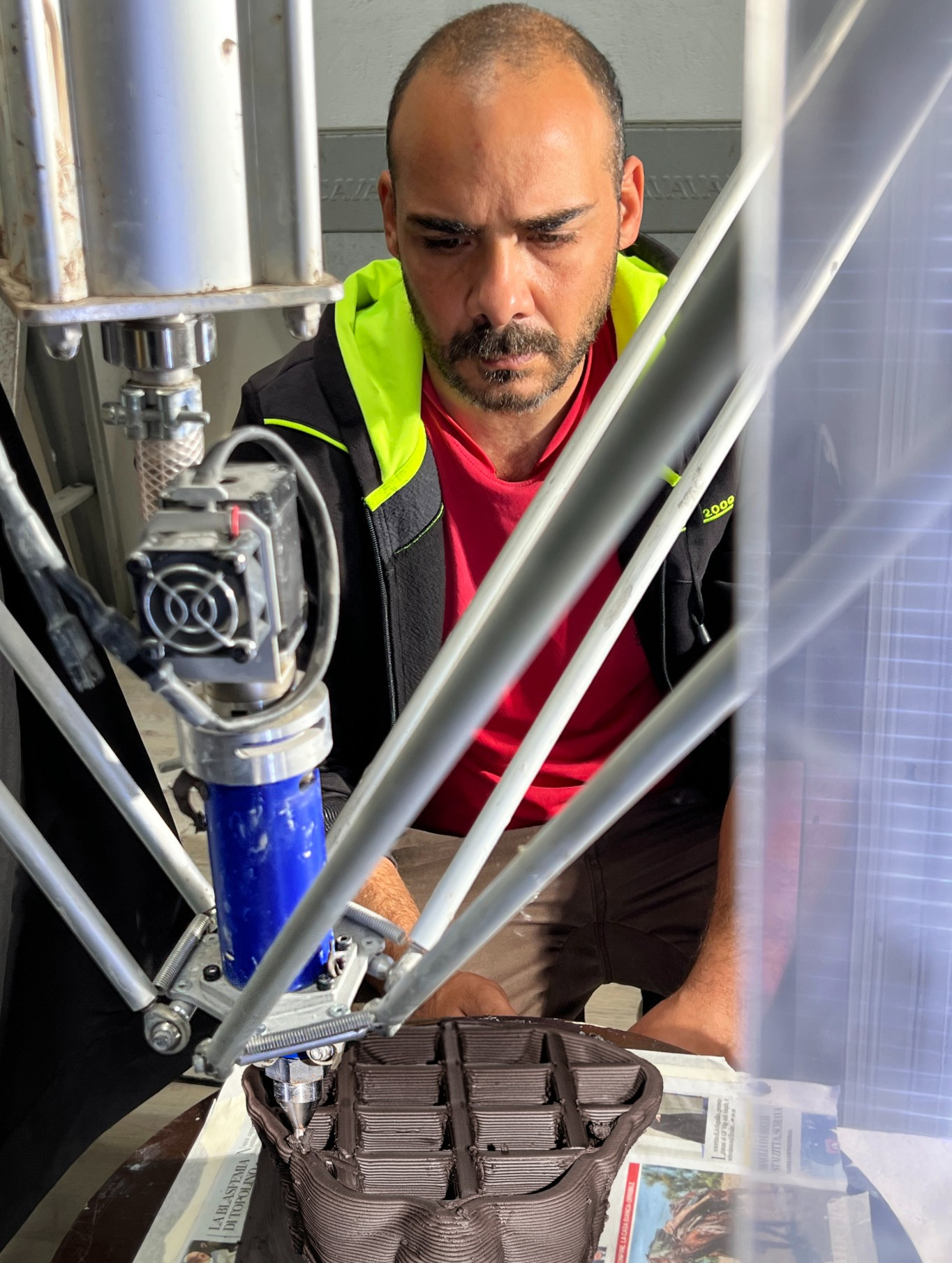 man with 3D printing machine