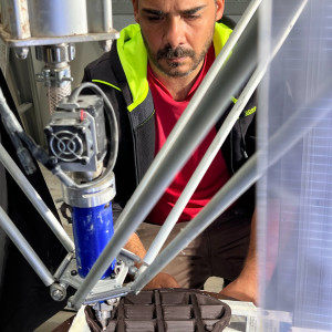 man with 3D printing machine.