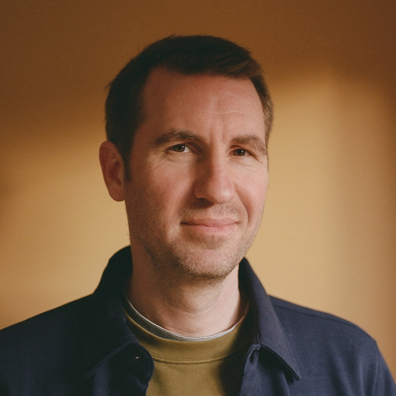 Smiling man in warm light