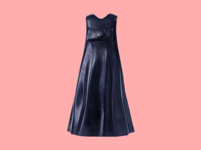 small black dress made out of marble with pink background