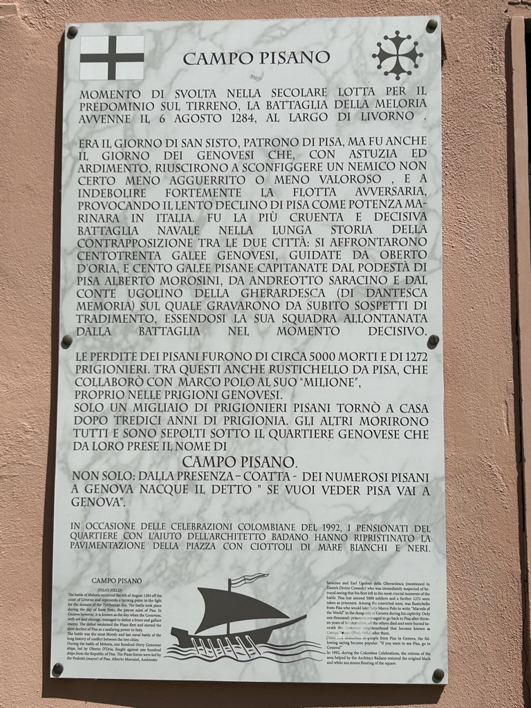 historical stone plaque in Italian describing Campo Pisano