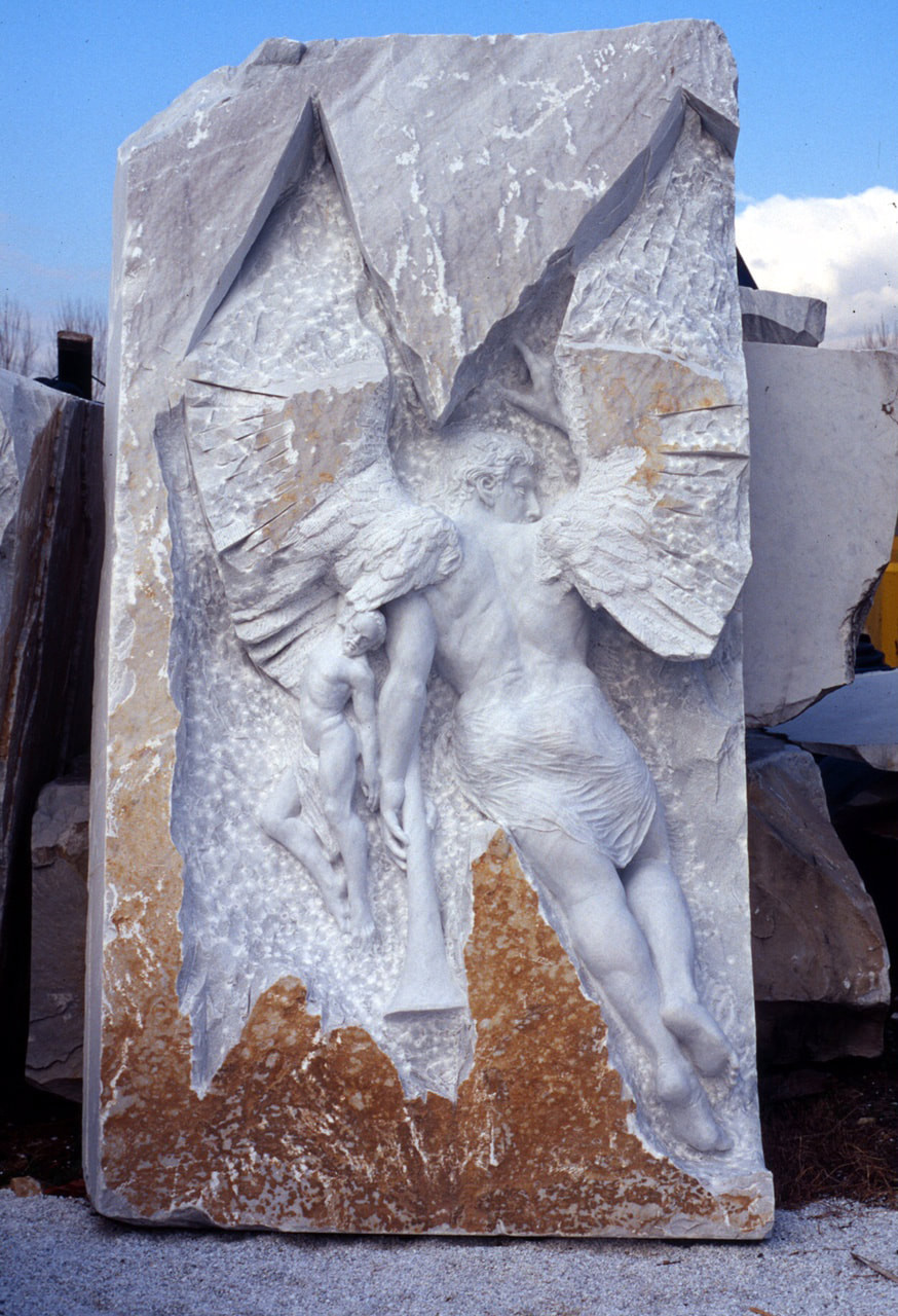 relief sculpture in marble of figure with wings