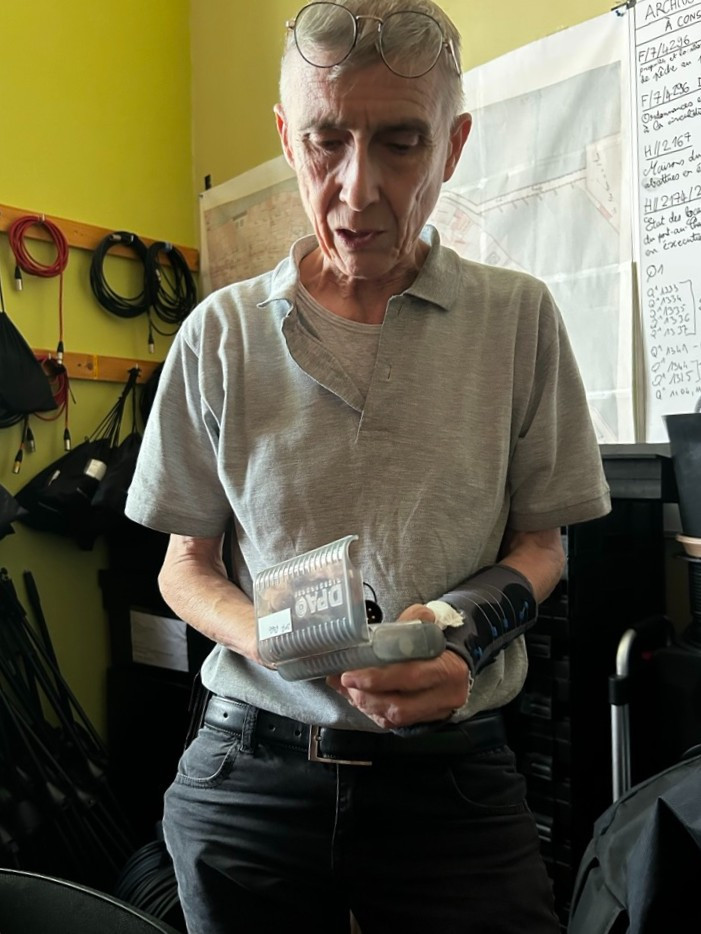 woman holding audio equipment