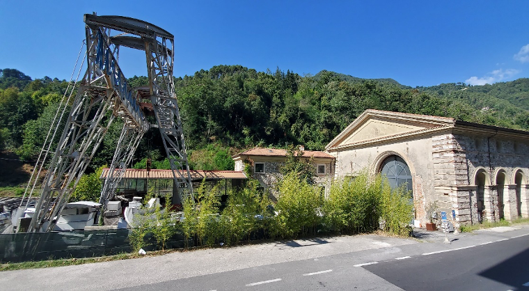 street view of Studio Artco on main road surrounded by trees