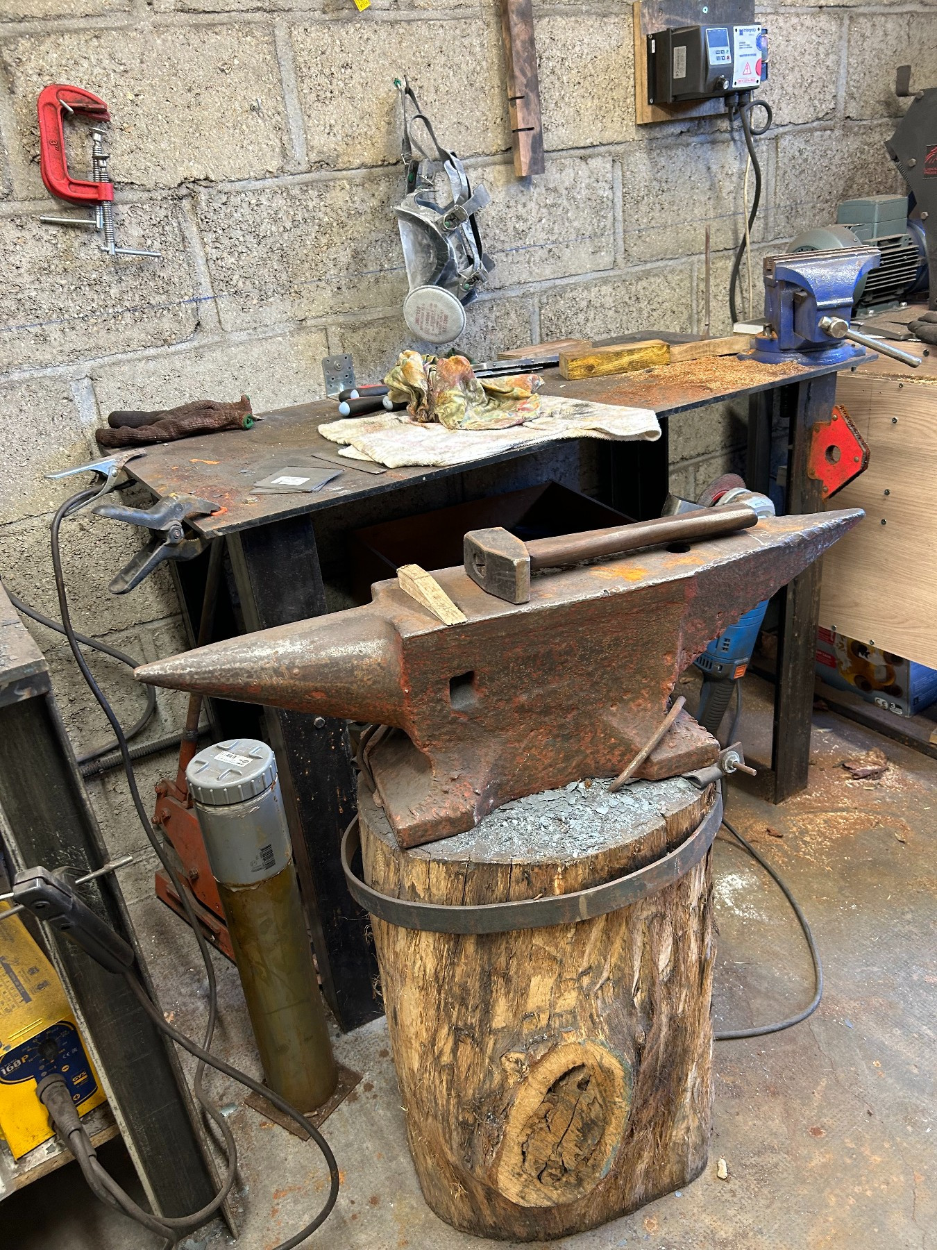 hammer laying on an anvil